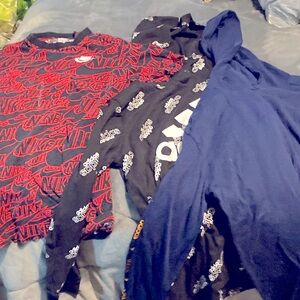 A bundle of Nike and Adidas boys clothing